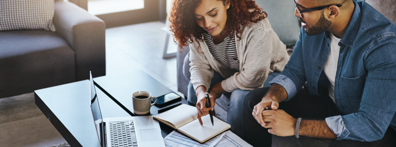 two people reviewing financial information