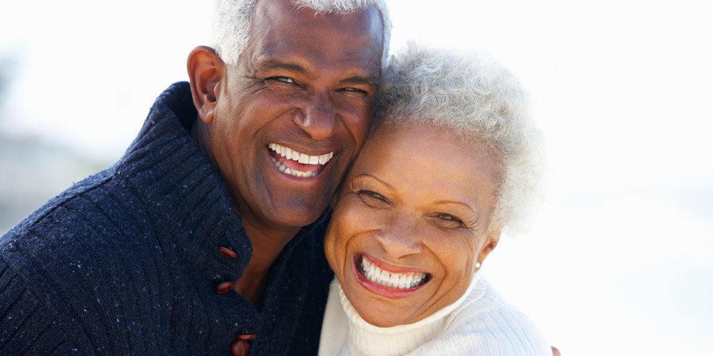 Older couple smiling and hugging